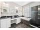 Large bathroom with double sinks, soaking tub, and separate glass-enclosed shower at 1027 Banks Rose St, Celebration, FL 34747