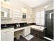 Bright bathroom featuring a soaking tub and glass enclosed shower with tile surround at 1027 Banks Rose St, Celebration, FL 34747