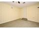 Neutral bedroom has bright windows with three steps and access to a door at 1027 Banks Rose St, Celebration, FL 34747
