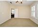 Bedroom features a view of the Primary bathroom with a fan and plenty of light at 1027 Banks Rose St, Celebration, FL 34747