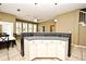 Features an open floor plan with the kitchen island and view to dining and living spaces at 1027 Banks Rose St, Celebration, FL 34747