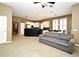 Spacious living area connected to kitchen featuring kitchen island, lots of natural light at 1027 Banks Rose St, Celebration, FL 34747