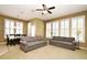 Open concept living room and dining area, featuring abundant natural light and inviting decor at 1027 Banks Rose St, Celebration, FL 34747