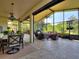 Enjoy the shade in this oversized lanai, ideal for entertaining with dining and seating, or simply relaxing at 1233 Cambria Bnd, Kissimmee, FL 34759