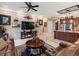 Spacious living room flows seamlessly into the gourmet kitchen, perfect for entertaining guests and Gathering gatherings at 1233 Cambria Bnd, Kissimmee, FL 34759