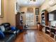 The office features built in shelves, a desk, and a large window with plantation shutters at 1233 Cambria Bnd, Kissimmee, FL 34759
