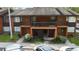 Multi-Gathering home with exterior staircase, balcony, and well-maintained landscaping at 1240 Sago Palm Blvd # 1240, Kissimmee, FL 34741