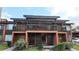 Two-story condo featuring covered balcony, private entrance and muted earth-tone color palette at 1240 Sago Palm Blvd # 1240, Kissimmee, FL 34741