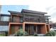 Two-story condo featuring covered balcony, private entrance and muted earth-tone color palette at 1240 Sago Palm Blvd # 1240, Kissimmee, FL 34741