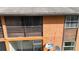 Close-up of a condo unit with a balcony, offering a view of the community at 1240 Sago Palm Blvd # 1240, Kissimmee, FL 34741