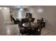 Open floorplan living space with dining area, living room and natural light at 1240 Sago Palm Blvd # 1240, Kissimmee, FL 34741