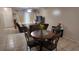 Open floorplan living space with dining area, living room and natural light at 1240 Sago Palm Blvd # 1240, Kissimmee, FL 34741