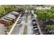 Overhead shot of ample resident and guest parking spaces on beautifully landscaped grounds at 1240 Sago Palm Blvd # 1240, Kissimmee, FL 34741