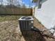 Image of the AC unit outside with a new wooden fence surrounding the spacious backyard at 1749 Sorolla Ct, Orlando, FL 32811