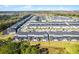 Aerial view of the neighborhood, showcasing the property's community and landscaping at 2569 Reading Trl, Kissimmee, FL 34746