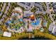 Overhead shot of luxurious resort-style pool and amenity center with water park at 2569 Reading Trl, Kissimmee, FL 34746