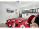 Fun bedroom featuring a bunk bed, a queen bed, and a Mickey Mouse theme at 2569 Reading Trl, Kissimmee, FL 34746