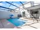 Enjoy the private, screened-in pool with patio access for seamless indoor-outdoor living at 2569 Reading Trl, Kissimmee, FL 34746