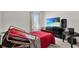 Modern bedroom with a tv, speakers, a large window and natural light at 260 Willow Bend Dr, Davenport, FL 33897