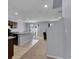 Bright, open-concept space with a kitchen island that flows into a cozy dining area at 260 Willow Bend Dr, Davenport, FL 33897