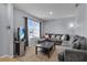 Comfortable living room features a large sectional sofa and a modern entertainment setup at 260 Willow Bend Dr, Davenport, FL 33897