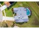 Birds eye view of home with an in-ground pool, and a well maintained lawn at 2718 Nakina Ct, Orlando, FL 32837