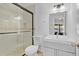 Modern bathroom featuring a glass-enclosed shower, sleek vanity, and updated fixtures at 30 Las Palmas Way, Kissimmee, FL 34743