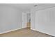 Light-filled bedroom with wood-look floors and closet space at 30 Las Palmas Way, Kissimmee, FL 34743