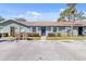 Charming one-story home with well-maintained landscaping and parking at 30 Las Palmas Way, Kissimmee, FL 34743