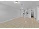 Expansive living room showcasing open floor plan with tile flooring at 30 Las Palmas Way, Kissimmee, FL 34743