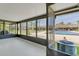 Enclosed patio overlooking the pool and backyard at 30 Las Palmas Way, Kissimmee, FL 34743