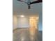 Open-concept living area with hardwood floors, ceiling fan and neutral walls at 3555 Rodrick Cir, Orlando, FL 32824