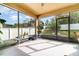 Enclosed patio with tiled floor, lots of sunshine and potted plants at 3705 Apopka Ridge Cir, Apopka, FL 32703