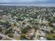 Aerial view of neighborhood homes and tree lined streets, near the coast at 406 10Th St, St Cloud, FL 34769