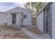 Backyard featuring a walkway, the house, and an external building at 406 10Th St, St Cloud, FL 34769