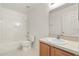 Clean bathroom featuring a combined tub and shower plus vanity with mirror at 4061 Flowering Peach Ln, St Cloud, FL 34772
