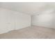 Carpeted bedroom featuring a closet and neutral wall paint at 4061 Flowering Peach Ln, St Cloud, FL 34772