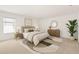 Cozy main bedroom boasts natural light and soft decor at 4061 Flowering Peach Ln, St Cloud, FL 34772