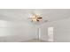 The main bedroom boasts a ceiling fan and an ensuite bathroom at 4061 Flowering Peach Ln, St Cloud, FL 34772