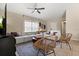 Inviting living room featuring modern furnishings, neutral tones, and a comfortable seating arrangement at 407 Reserve Dr, Davenport, FL 33896