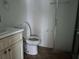 Bathroom with a toilet, shower and a sink at 4179 Spitfire Ave, Kissimmee, FL 34741