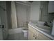 Bathroom featuring a bathtub with shower, toilet, and sink at 4179 Spitfire Ave, Kissimmee, FL 34741