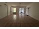 Spacious living room with tile flooring and access to the outdoor patio at 4179 Spitfire Ave, Kissimmee, FL 34741