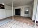 Covered patio area with tile flooring, offering outdoor living space at 4179 Spitfire Ave, Kissimmee, FL 34741