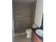 Bathroom showcasing a tiled walk-in shower and vanity with sink at 445 Fountainhead Cir # 264, Kissimmee, FL 34741