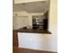 Kitchen featuring granite counters and stainless appliances at 445 Fountainhead Cir # 264, Kissimmee, FL 34741