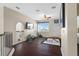 Comfortable bonus room with TV, exercise equipment, and access to other rooms at 478 Chelsea Ave, Davenport, FL 33837