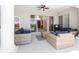 Spacious covered patio with elegant seating, ideal for outdoor relaxation and entertaining with views of the pool at 478 Chelsea Ave, Davenport, FL 33837