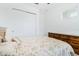 Clean bedroom with a large closet, ceiling fan, and an antique dresser at 5151 Twin Lakes Blvd, St Cloud, FL 34772