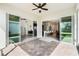 Wide sliding doors that lead to a large kitchen with updated appliances and bar seating at 5151 Twin Lakes Blvd, St Cloud, FL 34772